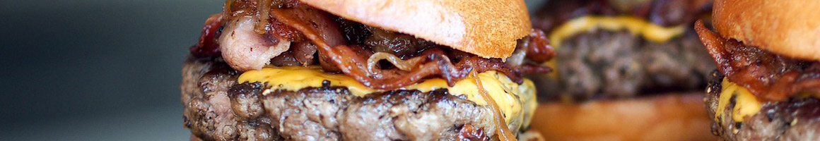 Eating Burger at Burger Shack restaurant in Lynbrook, NY.